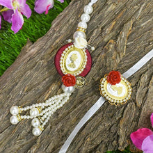 Load image into Gallery viewer, Silver Coin Beautiful Pearl Bhaiya Bhabhi Rakhi Set of 2