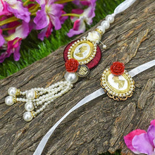 Load image into Gallery viewer, Silver Coin Beautiful Pearl Bhaiya Bhabhi Rakhi Set of 2
