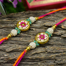 Load image into Gallery viewer, Hand painted Round Floral Rakhis (Set of 2)