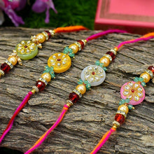 Load image into Gallery viewer, Stunning Round Kundan Rakhi Set of 4