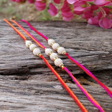 Load image into Gallery viewer, Suave Handcrafted White Beaded Rakhi (Set of 3)
