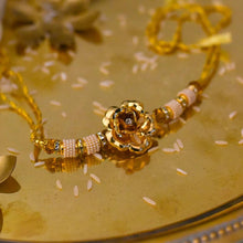 Load image into Gallery viewer, Exquisite Handcrafted 24K Gold Foil Rose Rakhi
