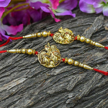 गैलरी व्यूवर में इमेज लोड करें, Sparkling Radha Krishna Golden Rakhi(Set of 2)
