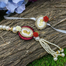 Load image into Gallery viewer, Silver Coin Beautiful Pearl Bhaiya Bhabhi Rakhi Set of 2
