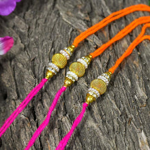 Load image into Gallery viewer, Modern Chic Golden Rakhi Set of 3
