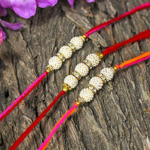 Load image into Gallery viewer, Suave Handcrafted White Beaded Rakhi (Set of 3)
